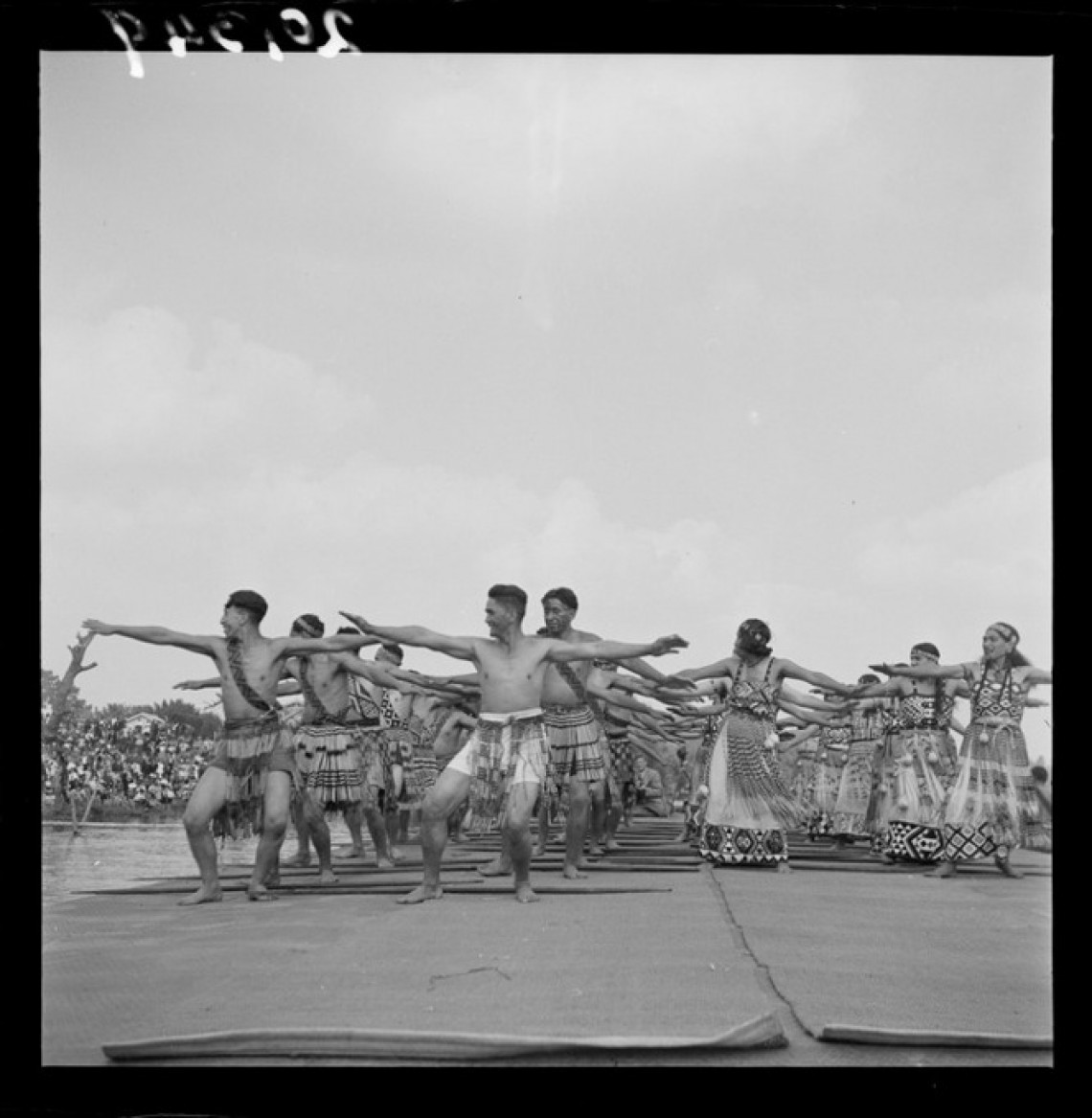 Tainui Maori performing action songs for United States servicemen at Ngaruawahia. Ref: 1/4-000349-F. Alexander Turnbull Library, Wellington, New Zealand.